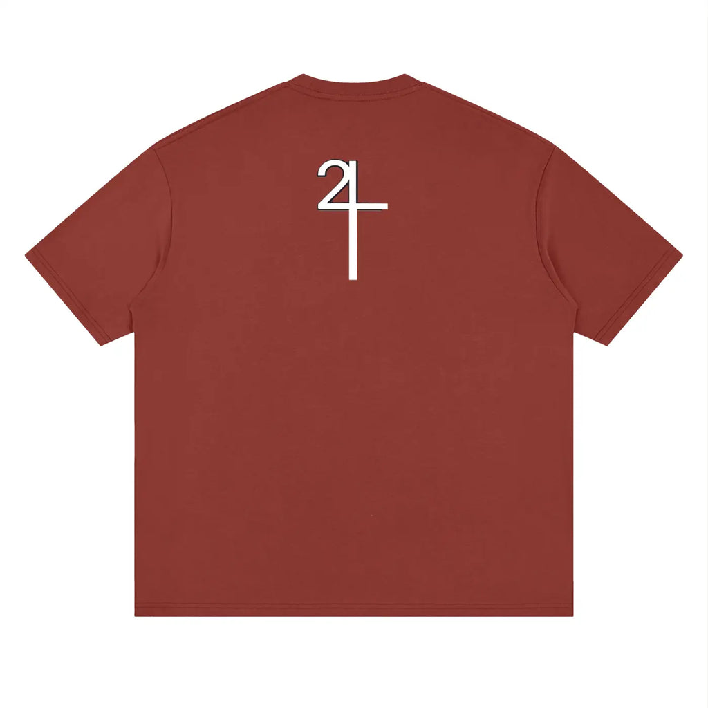 Back of a rust-colored i am church drop shoulder t-shirt with a bold white 24 graphic in christian streetwear uk style